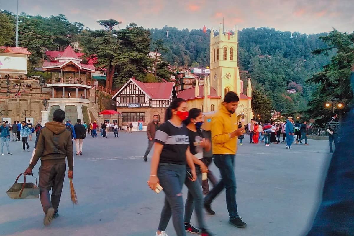 Evening crowds on the Ridge in Shimla with Christ Church and the old library behind